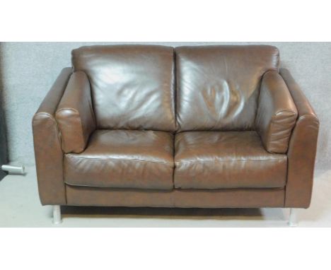 A contemporary two seater brown leather sofa. H.85 W.146 D.88cm 