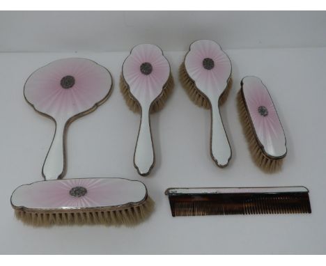 A vintage six piece fading pink to white engine turned decoration guilloché enamel and silver dressing set hallmarked C&amp;A