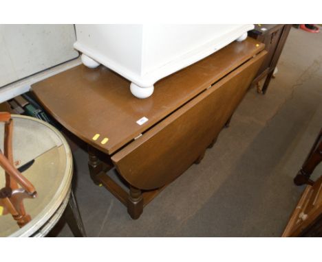 A oak drop leaf table