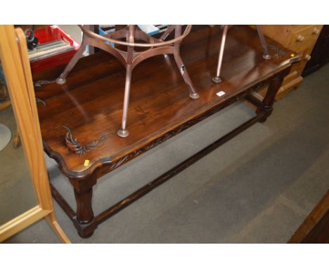 A stained pine coffee table 