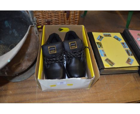 A pair of as new Dunlop safety boots UK size 8.5