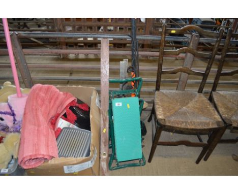 A garden kneeler; a spirit level; sash clamps and a pick axe etc