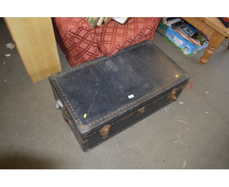 A leather bound travelling trunk