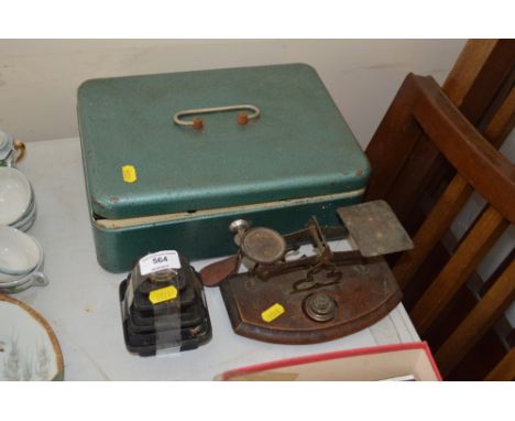 A set of scales and weights together with a lock box