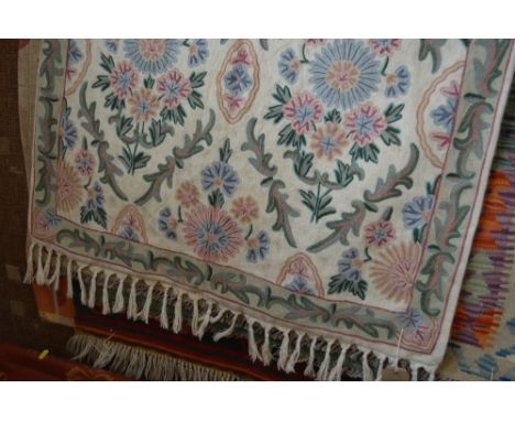 An approx 4'7" x 2'10" old Kashmir hand stitched wool chain rug