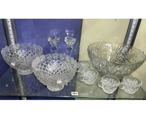 SHELF OF GLASSWARE INCLUDING A PAIR OF BOHEMIA CANDLESTICKS, PAIR OF POLISH CRYSTAL BOWLS, PUNCH BOWL AND CUPS