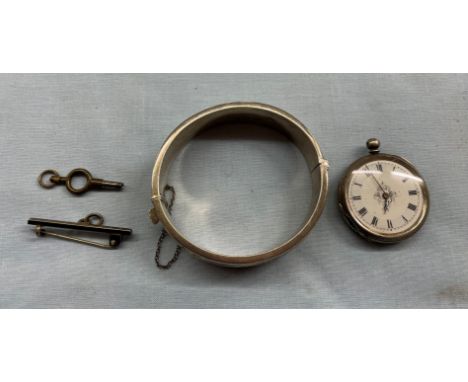 ENGRAVED SILVER BANGLE AND A LADIES SILVER FOB WATCH