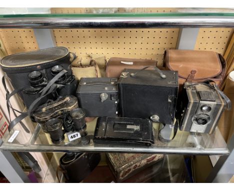 THREE VINTAGE PAIRS OF BINOCULARS AND FOUR VINTAGE CAMERAS
