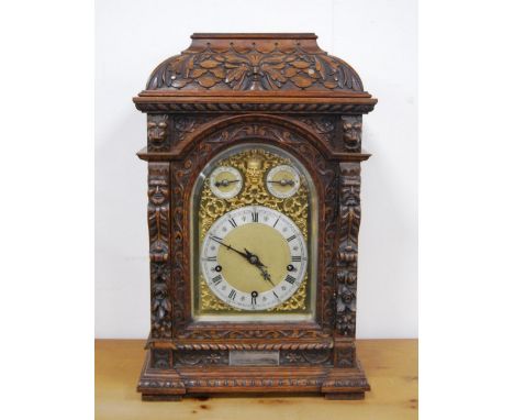 Late 19th century carved oak continental bracket clock by Winterhalder &amp; Hofmeier, retailed by DC Rait &amp; Sons, Glasgo