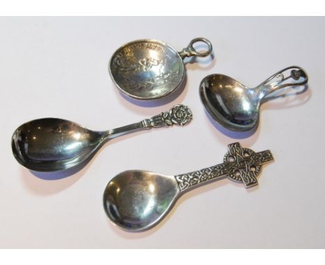 Spoon with celtic cross grip, Glasgow 1946, another with seeded rose terminal, Birmingham 1973, another with pierced thistle 
