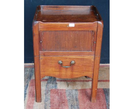 George III mahogany night commode with a tray top gallery above a tambour shutter door and commode drawer, 74cm high, 53cm wi