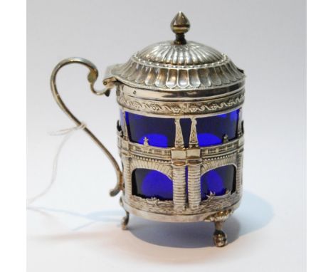 Dutch 19th century silver mustard pot, pierced and embossed with figures and carriages upon a bridge, 84g.CONDITION REPORT: U