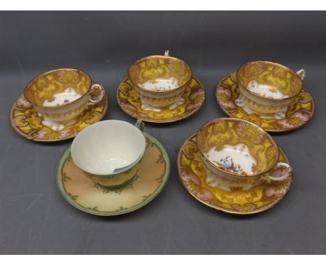 Set of four Royal Worcester cups and saucers with yellow and gilded border, central floral design (a/f) together with a furth