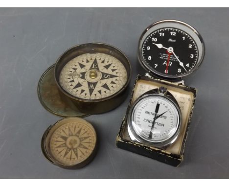 Mixed Lot: two varying sized brass lidded circular compasses, together with a Metro Dome Cadenzia stop watch (a/f) and a furt