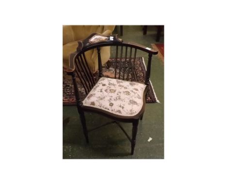 Late Victorian ebonised and inlaid comb-back corner chair with dolphin detail to the cresting rail, on four ring turned legs 