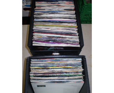 2 CASES OF SINGLES INC ROLLING STONES AND JOHN LENNON