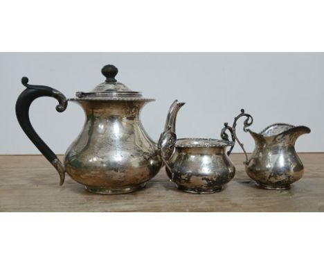 A three pieces hallmarked silver bachelor's tea service, gross weight 17.5ozt.&nbsp;Condition - general wear including minor 
