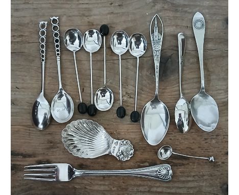 Assorted hallmarked silver including a caddy spoons, various other spoons and a fork.