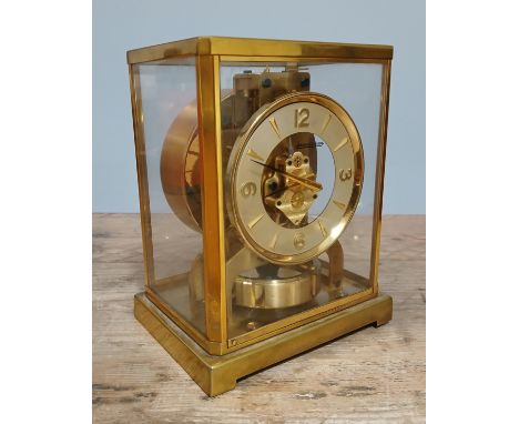 A JAEGER-LECOULTRE ATMOS CLOCK, gilt brass and glass cased, number 89207, height 22cm.Condition - appears in working order, g
