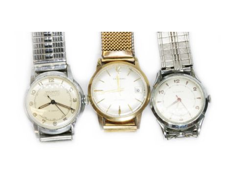 A 9ct gold Garrard automatic wristwatch and two other vintage mechanical watches.