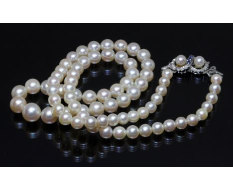 A graduated cultured pearl necklace, the pearls ranging in diameter from approximately 5.3mm to 8.6mm, 18ct white gold clasp 