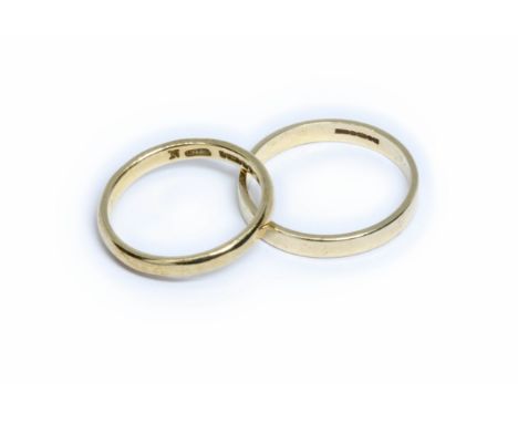 Two hallmarked 9ct gold wedding bands, weight 4g, size N &amp; P.Condition - good, general wear.