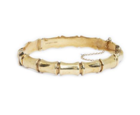 A 9ct gold bangle, faux bamboo effect, sponsor C.P.S, Birmingham 1963, diameter 60mm, weight 13.3g.Condition - slight ding/cr