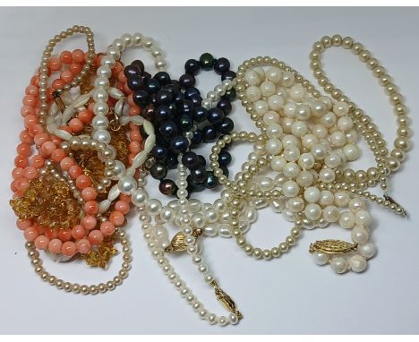 Assorted beaded necklaces and one bracelet, including cultured pearl, simulated pearl, coral and amber each with clasps hallm