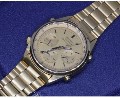 A gold plated Seiko quartz chronograph wristwatch, ref. 7A28-7020, case diameter 37mm, with box and papers.Condition - not cu
