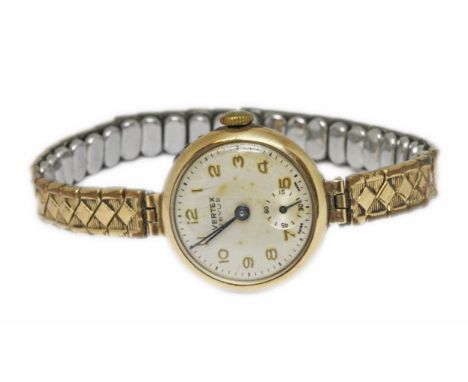 A laides 9ct gold cased Vertex wristwatch with gold plated strap.