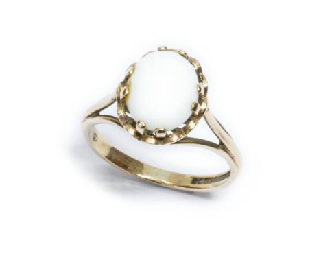 A 9ct gold opal cabochon ring, the opal measuring approximately 10mm x 8mm, sponsor L.D.P.LTD, Birmingham 1995,m gross weight