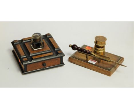 A Victorian walnut and ebonised desk stand, having single glass inkwell, with single drawer below; together with a brass desk