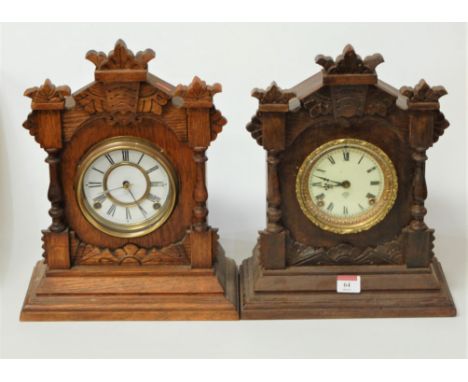 A late 19th century American oak cased mantel clock, having enamelled dial with Roman numerals and eight day movement by the 