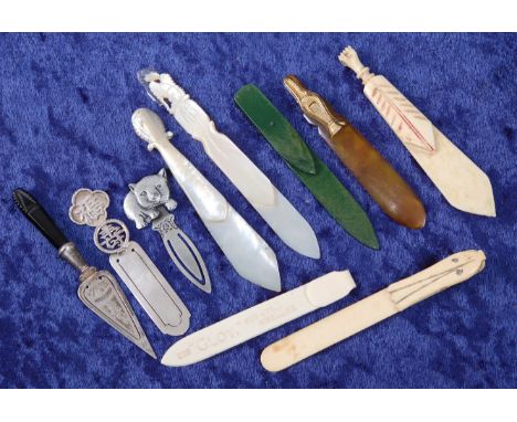 A Victorian novelty bookmark in the form of a trowel, having a carved jet handle, length 9.5cm; together with a Chinese white