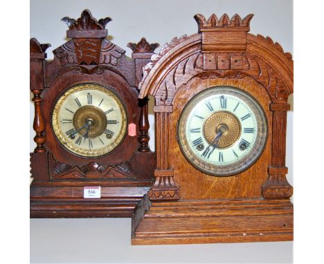 An early 20th century oak cased eight day mantel clock, the enamelled chapter ring having Roman numerals, h.36cm; together wi
