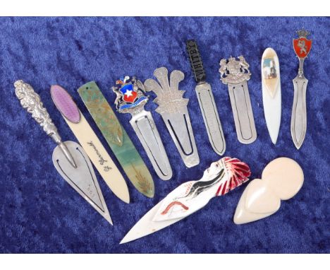 A late Victorian silver novelty bookmark in the form of a trowel, the handle having C-scroll decoration, maker Levi &amp; Sal
