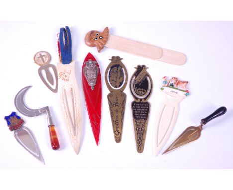 A novelty bookmark in the form of a scythe, having agate handle, length 8.5cm; together with a brass novelty bookmark in the 