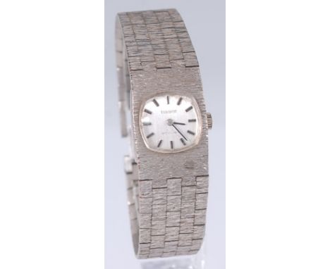 A lady's Tissot Stylist steel cased wristwatch, having signed silvered dial, baton markers, manual wind movement, and on inte