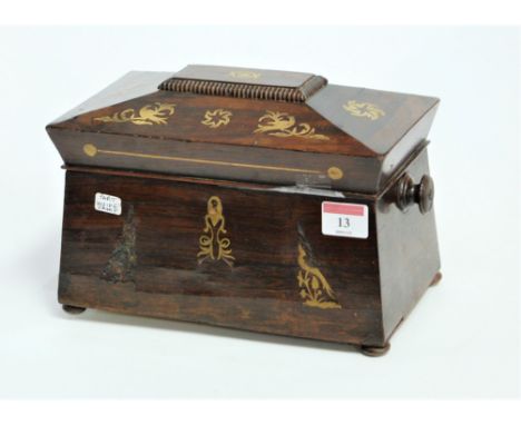 A Regency rosewood and cut brass inlaid tea caddy, of sarcophagus form (lacking interior), w.25cm