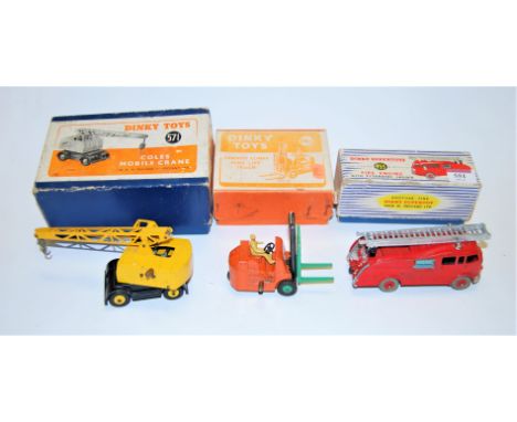 A Dinky Toys No.955 fire engine, with extending ladder, boxed; a Dinky No.571 Coles mobile crane, boxed; and a Dinky No.14C C