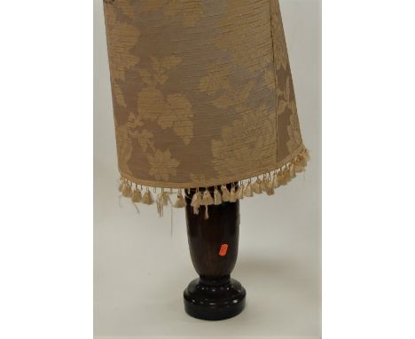 A turned oak table lamp base with floral silk shade, height 70cm including shade