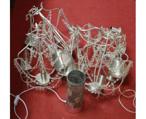 A set of four modern three sconce ceiling light fittings with glass drops together with a similar lamp