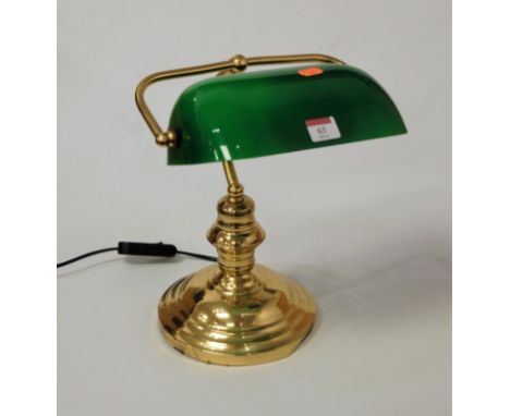 A modern lacquered brass desk lamp, with adjustable green glass shade