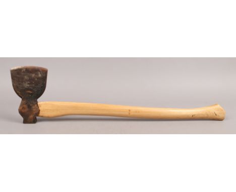 A military issue axe with hickory handle and broad arrow mark.