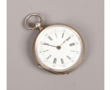 An antique continental silver fob watch with enamel dial.