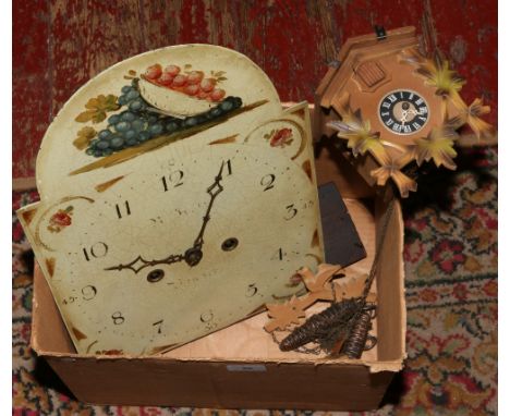 A hand painted 30 day long case clock dial and movement, along with a cuckoo clock.
