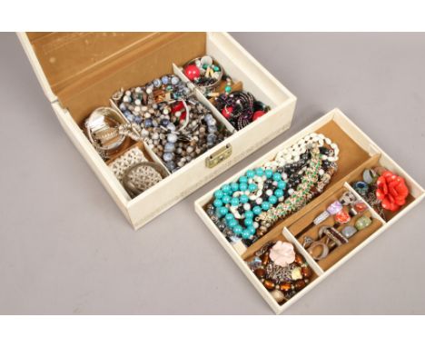 A case of costume jewellery to include rings, necklaces, beads, bracelets etc.