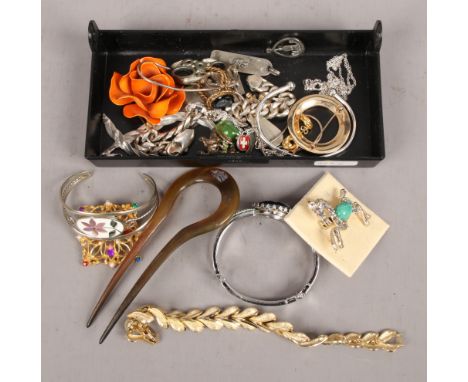 A small box of costume jewellery, to include bangles, bracelets, pendant and chain etc.