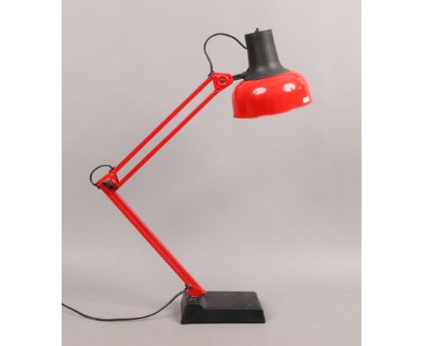 A painted anglepoise reading lamp.