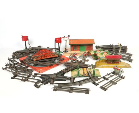 Two boxes of Hornby clockwork 0 gauge tinplate model railway. Including 0-4-0 LMS tank engine, boxed rolling stock, boxed tur